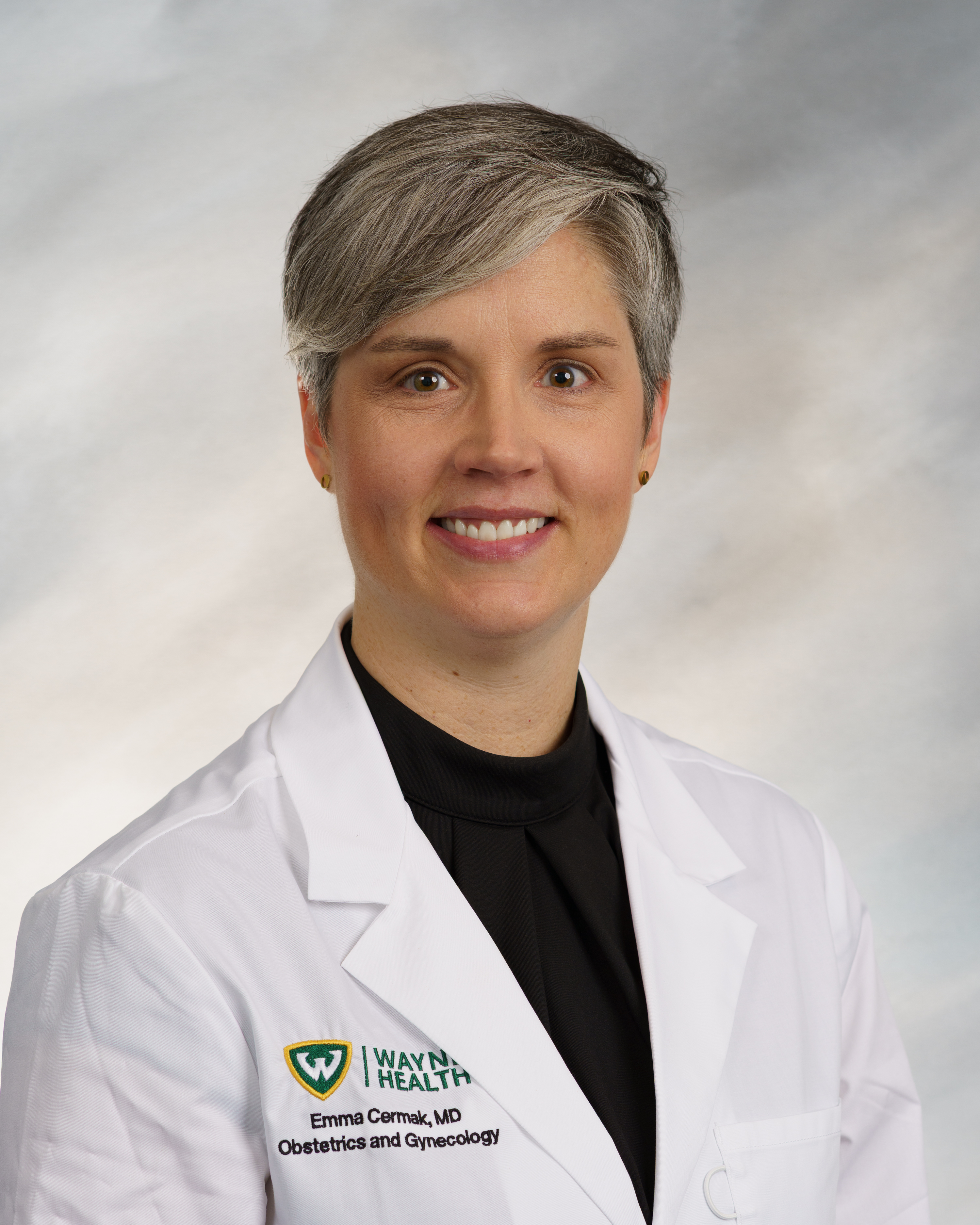 Dr. Cermak white Coat